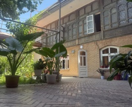 Кровать в общем номере в Гостевой дом Guest House Ozod