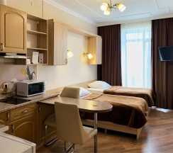 Студия с кухней и двумя односпальными кроватями в Calypso