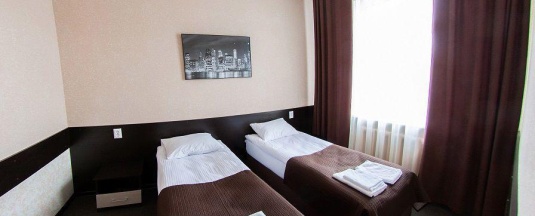 Номер стандарт семейный с 2 односпальными и 1 двуспальной кроватью в Дом твой