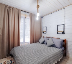 Двухместный коттедж двуспальная кровать в Винни-Вилла