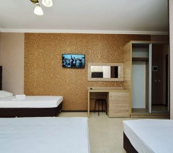 Четырёхместный номер Standard с балконом в AsTerias