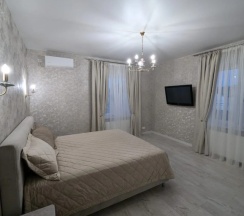 Шестиместный коттедж с балконом и рядом с пляжем в Гостевой дом