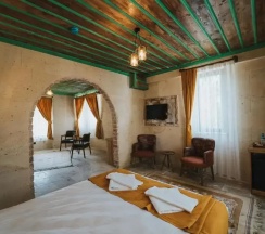 Двухместный люкс двуспальная кровать в La Casa Cave