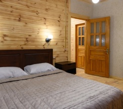 Двухместный номер в избе с 2 комнатами с красивым видом из окна двуспальная кровать в Вкс