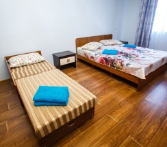 Трехместный номер с двуспальной и односпальной кроватями в Сочи Олимпийский парк Сириус