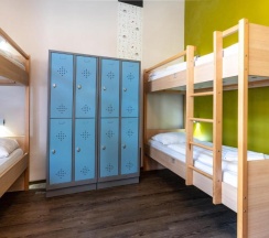 Кровать в общем номере в MEININGER Hotel Berlin Mitte