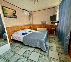 Семейный номер с терассой в Улей