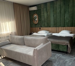 Джуниор сюит (Junior Suite) с двумя кроватями в Бира