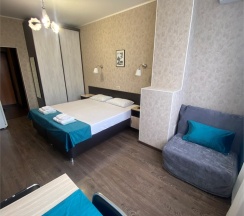 Трехместный номер с кухонной зоной в Joy apartments