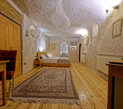 Двухместный люкс Cave Comfort двуспальная кровать в La Casa Cave
