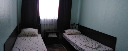Комната с 2 односпальными кроватями (удобства на этаже) в Мираж