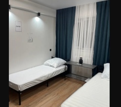 Трёхместный двухкомнатный номер категории стандарт в Городок