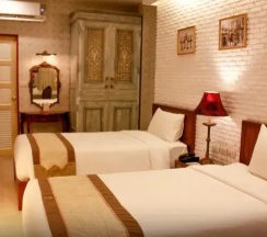 Двухместный номер Grand 2 отдельные кровати в Chuchai Buri Sri Amphawa