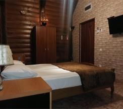 Двухместный номер категории "Супериор-Ракни" с двуспальной кроватью, с возможностью одного дополнительного места. в Викинг