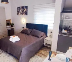 Двухместный люкс с террасой двуспальная кровать в Aspendos Suites