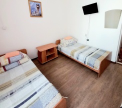 Кровать в 3-местном общем номере в Маргобай