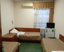 Кровать в 3-местном общем номере в Smart Hotel KDO Белгород