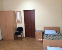 Кровать в общем номере в Мангазея