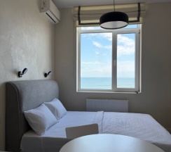 Уютная студия на 13 этаже с панорамным видом на Каспийское море. в Как Дома 05