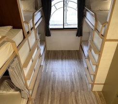 Кровать в общем номере в Terminal 58 hostel at town
