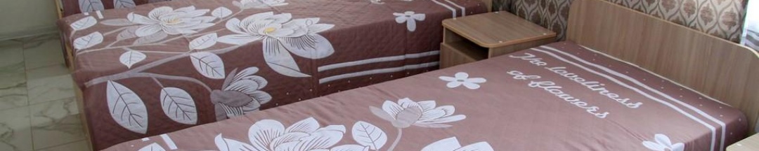 Кровать в 3-местном общем номере в Гостиница