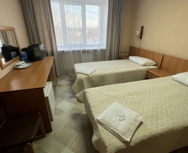 Эконом с двумя раздельными кроватями с умывальником в номере (сан узел и душ на этаже) в Ирень