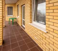 Люкс с балконом и кухонной зоной в Гостевой дом