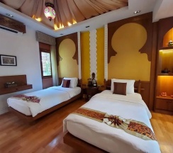 Двухместная вилла двуспальная кровать в Vartika Resovilla KuiBuri Beach Resort and Villas