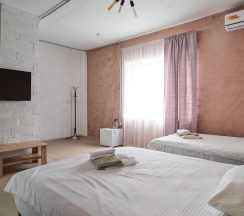 Номер полулюкс с 2 односпальными кроватями в Villa santarina