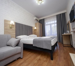 Двухместный номер Comfort с балконом и с видом на парк двуспальная кровать в Прометей 3