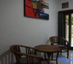 Двухместный номер Standard с видом на сад двуспальная кровать в Mai Guesthouse Sanur