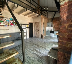 Семейные двухуровневые апартаменты с кухней в Loft Apart