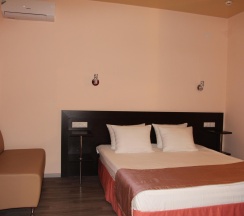 Номер люкс с 1 двуспальной кроватью в Триумф