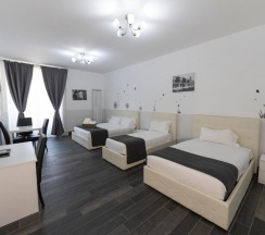 Четырёхместный номер Standard в Arch Rome Suites