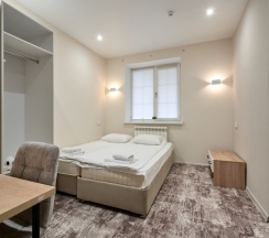 Улучшенный двухместный с 2 кроватями и 1 большой в Nogaev Hotel