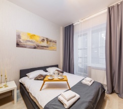 Улучшенная студия с кроватью king size и балконом в Pulkovo Apart