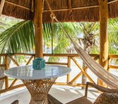 Номер Palapa с видом на океан в Shangri-la Caribe Beach Village Resort