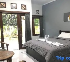 Двухместный номер Standard с видом на сад двуспальная кровать в Mai Guesthouse Sanur