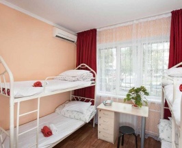 Кровать в общем номере в FM Hostel