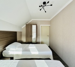 Семейный номер на мансарде в Граф