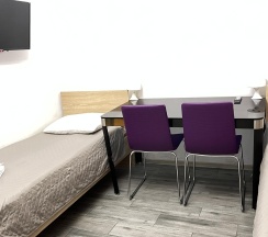 Номер стандарт с 2 односпальными кроватями (цокольный этаж) в Kovensky