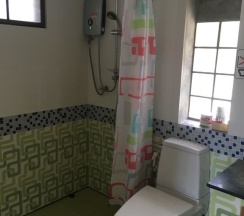 Двухместное бунгало Air-Con с видом на сад двуспальная кровать в Kaibae Beach Resort