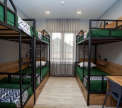 Кровать в общем номере с 3 двухъярусными кроватями (общие удобства) в Сириус