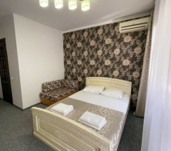 Номер с двуспальной кроватью в Киви