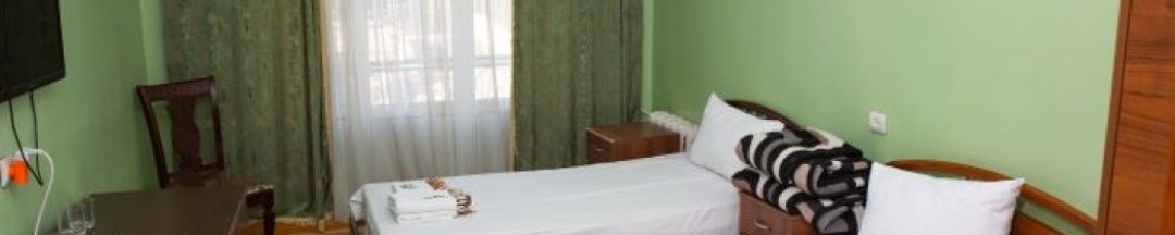Бюджетный двухместный номер с 2 отдельными кроватями в Каспий