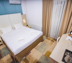 Делюкс с кроватью KING SIZE для 2 гостей в Мио