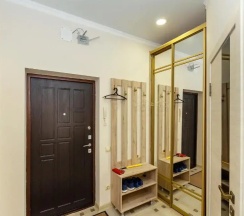 Апартаменты c 1 комнатой с балконом и рядом с пляжем в Апартаменты Apartment on Primorskaya