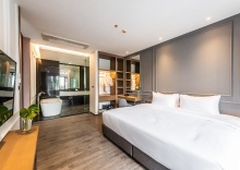 Люкс с красивым видом из окна в One Patio Hotel Pattaya