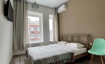 Четырёхместные апартаменты с балконом и с видом на город в Апартаменты Comfort 2:0