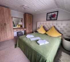 Апартаменты на мансарде в Шатун